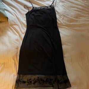 Black cocktail dress , filagree ,size 10